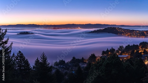 City nestled beneath a sea of morning mist.