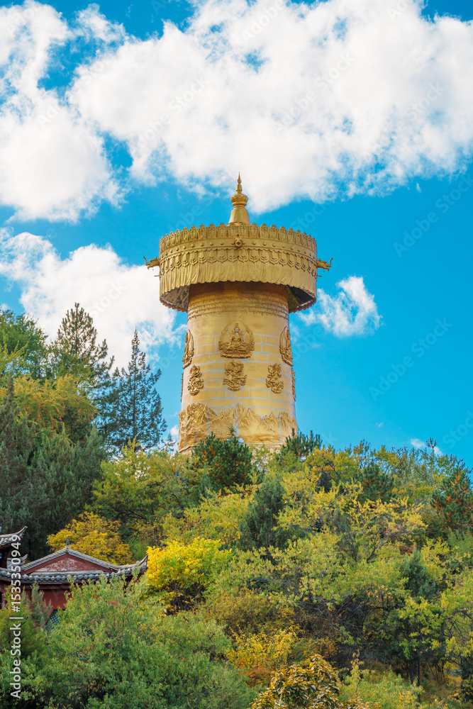 Fototapeta premium Golden Prayer Wheel on Guishan Park Hill