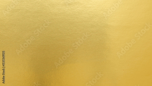 Gradation gold foil leaf shiny matt with sparkle yellow metallic texture background.
Abstract paper glitter golden glossy for template.
top view.