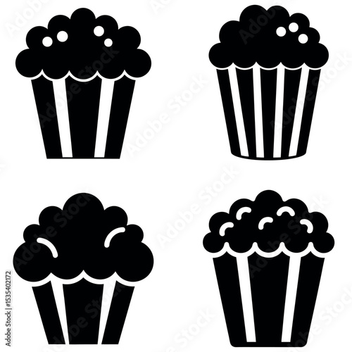 Black and White Featuring Four Cupcake Illustrations with Different Frosting and Liner Designs