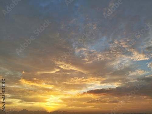 Dramatic sunrise sky view with clouds in summer season 