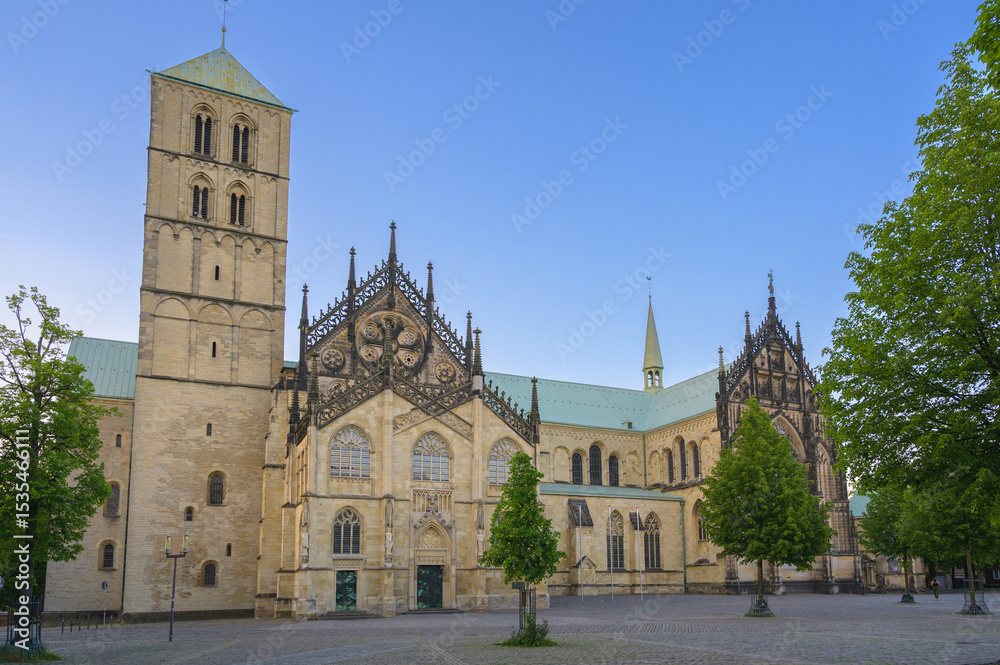Fototapeta premium Cathedral Saint Paulus stands majestically in Münster, Germany under clear blue sky