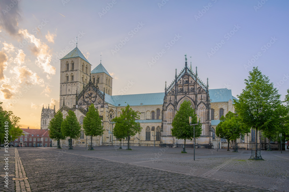 Obraz premium Cathedral Saint Paulus stands majestically in Münster, Germany under clear blue sky