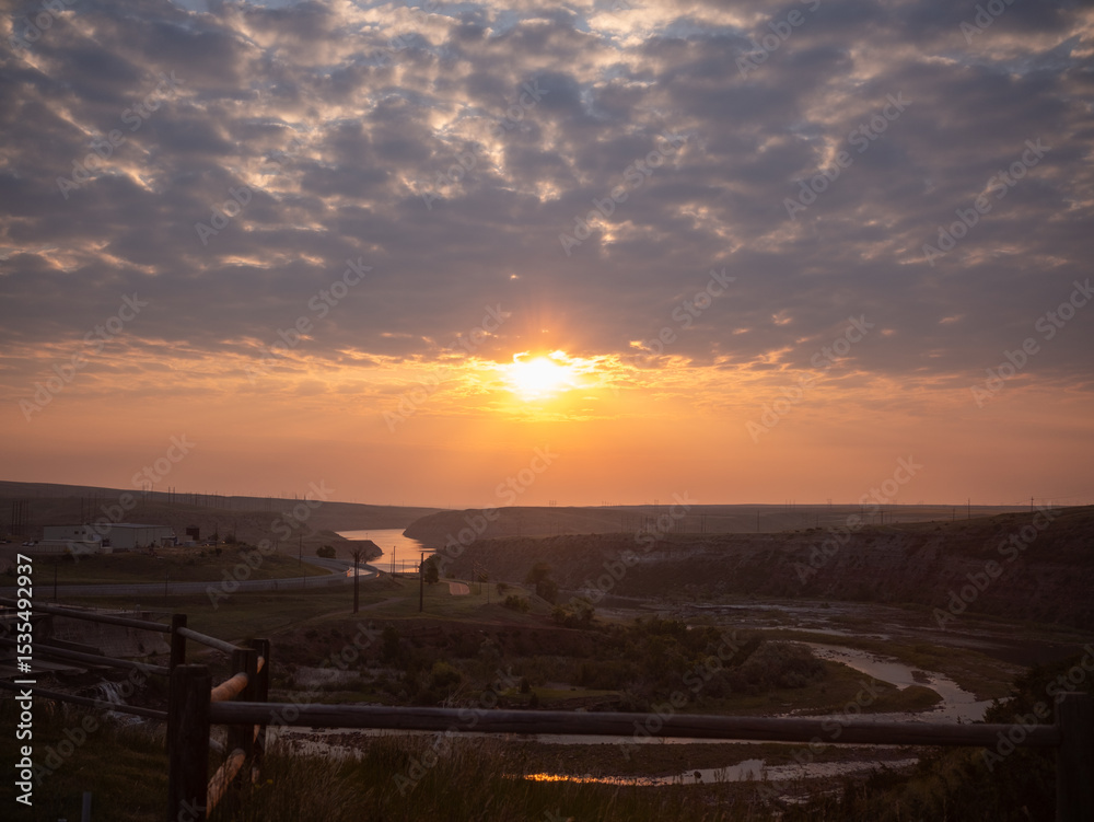 Fototapeta premium Sunrise Over the River Valley — Great Falls, Montana