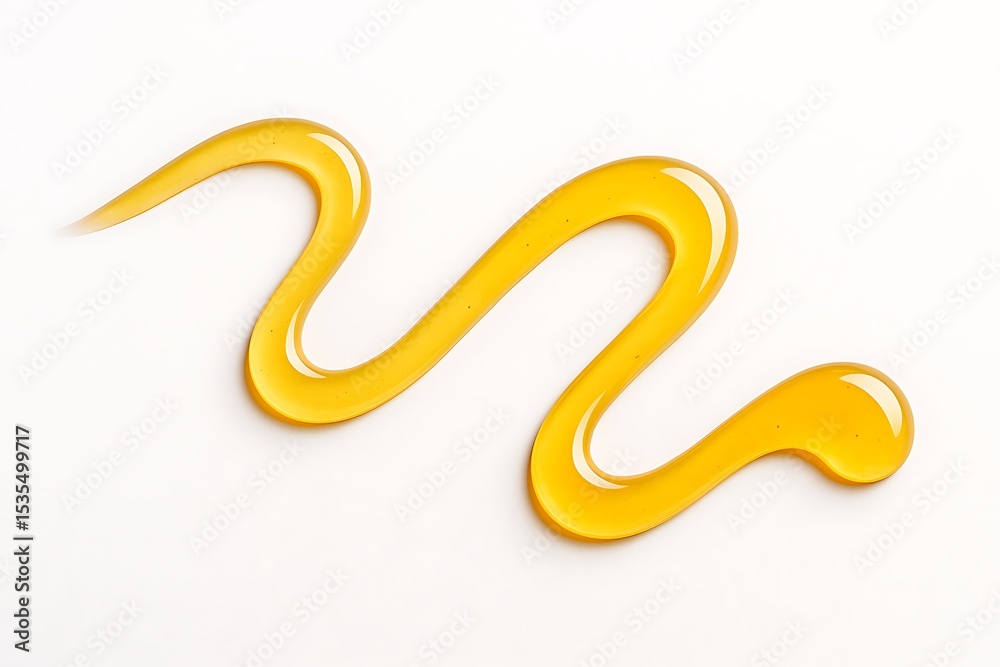 Fototapeta premium Golden honey drizzle on white background