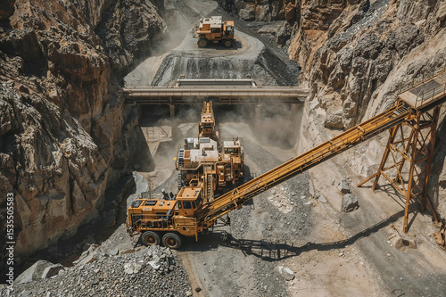 Spectacular View of Deep Mining Operation with Yellow Machinery and Dusty Environment in a Rocky Canyon