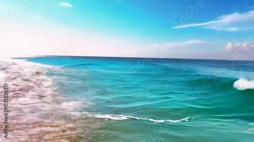 Wallpaper Mural Waves crashing at the ocean during daytime with blue skies and pink clouds, creating a dynamic seascape and aquatic scene. Torontodigital.ca