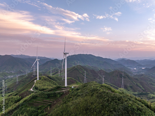 Wall Mural wind turbine and pylon on moutian