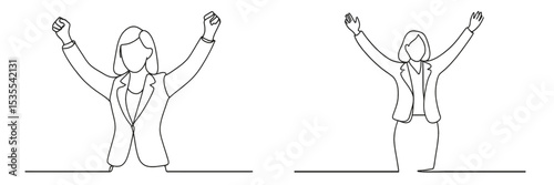 Celebrating success with raised arms in a professional environment during an uplifting moment