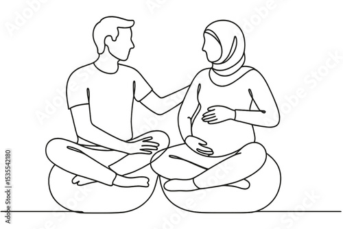 Pregnant woman and partner sharing an intimate moment during a peaceful discussion together at home