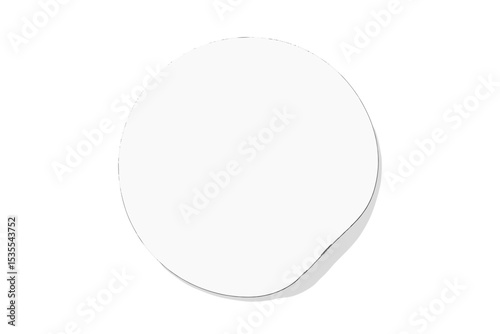Blank round sticky note ready for creative ideas in a bright workspace