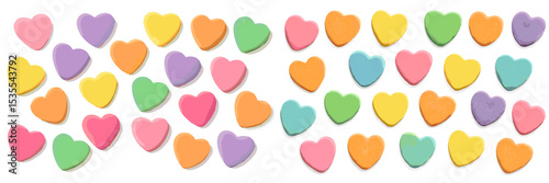 Colorful heart-shaped candies arranged neatly in various pastel colors during a festive celebration