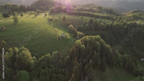Traditional Transylvanian mountain village in summer, with vibrant colors and rural landscape