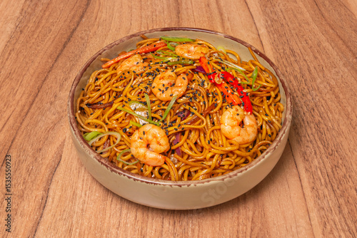  In the West, it is usually presented as soft noodles stir-fried with vegetables beef, pork, or shrimp