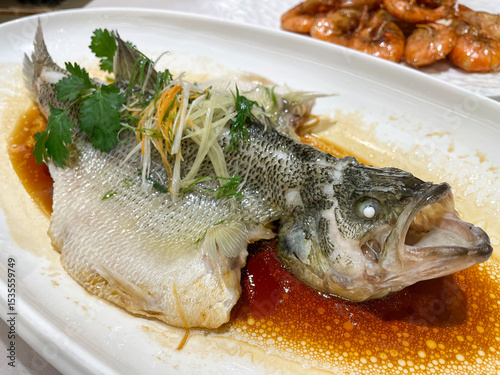 stamed bass on a plate photo