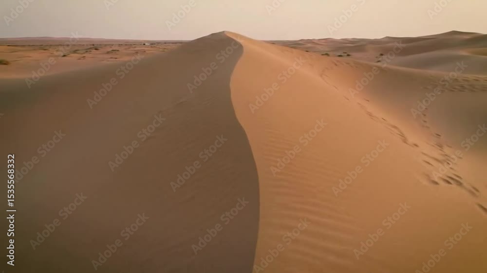 Desert dune with footprints
