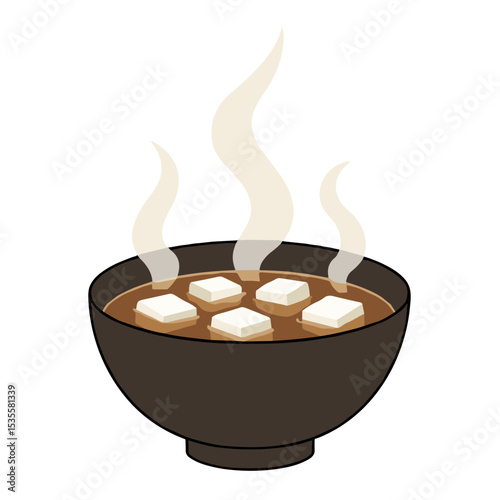 Hot bowl of soup with tofu cubes and steam rising above  