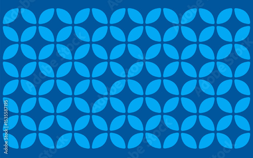 Ethnic style Indonesian Batik Ceplok motif, a simple geometric floral pattern featuring interlocking light blue rounded shapes on a dark blue background
