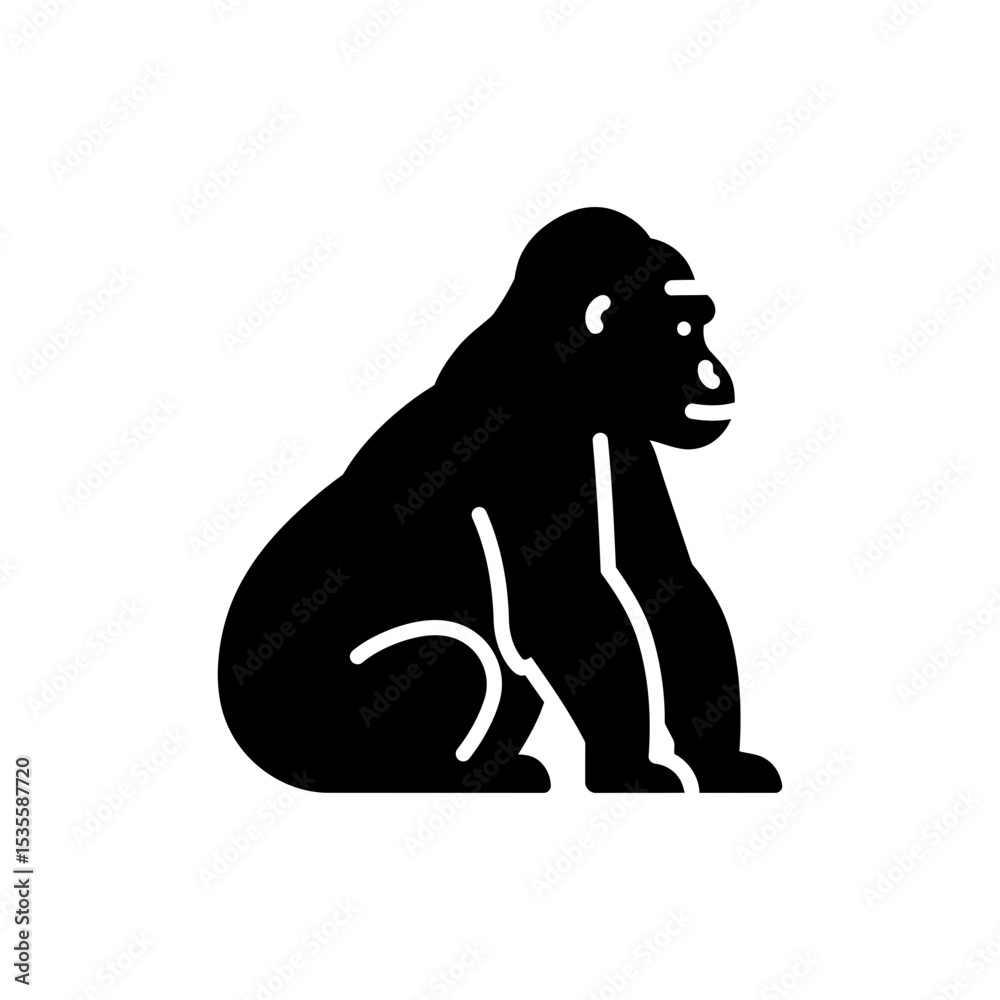 Obraz premium Gorilla sitting quietly in natural forest environment with calm posture