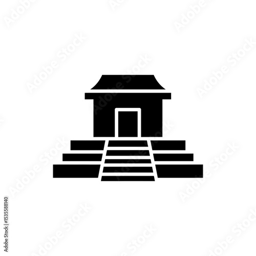 Ancient temple with layered steps and rectangular entrance facade