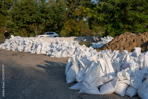 A sacks are filled with sand for use as a wall to prevent flooding in urban areas.