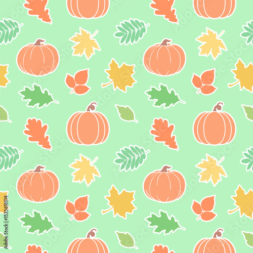Seamless pattern of autumn leaves and pumpkins isolated on green background.
