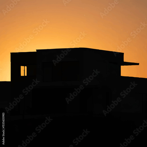 Modern House Silhouette Against Blue Sky Backdrop

