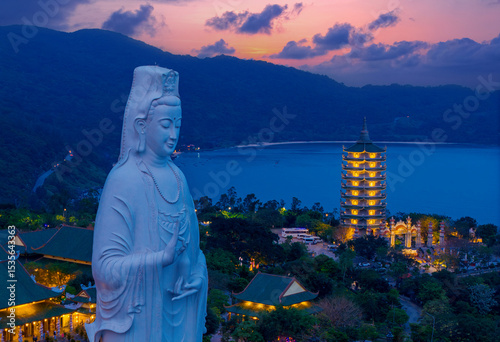Photography Serene sunset view of lady buddha statue and linh ung pagoda in Da nang, Vietnam