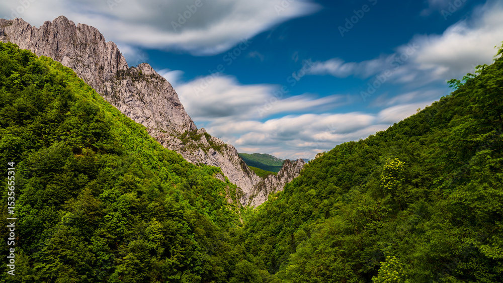 Fototapeta premium Sutjeska National Park in Bosnia and Herzegovina. Mountains and forest in summer. A valley in the mountains near the villages of Tjentište and Kruševo.