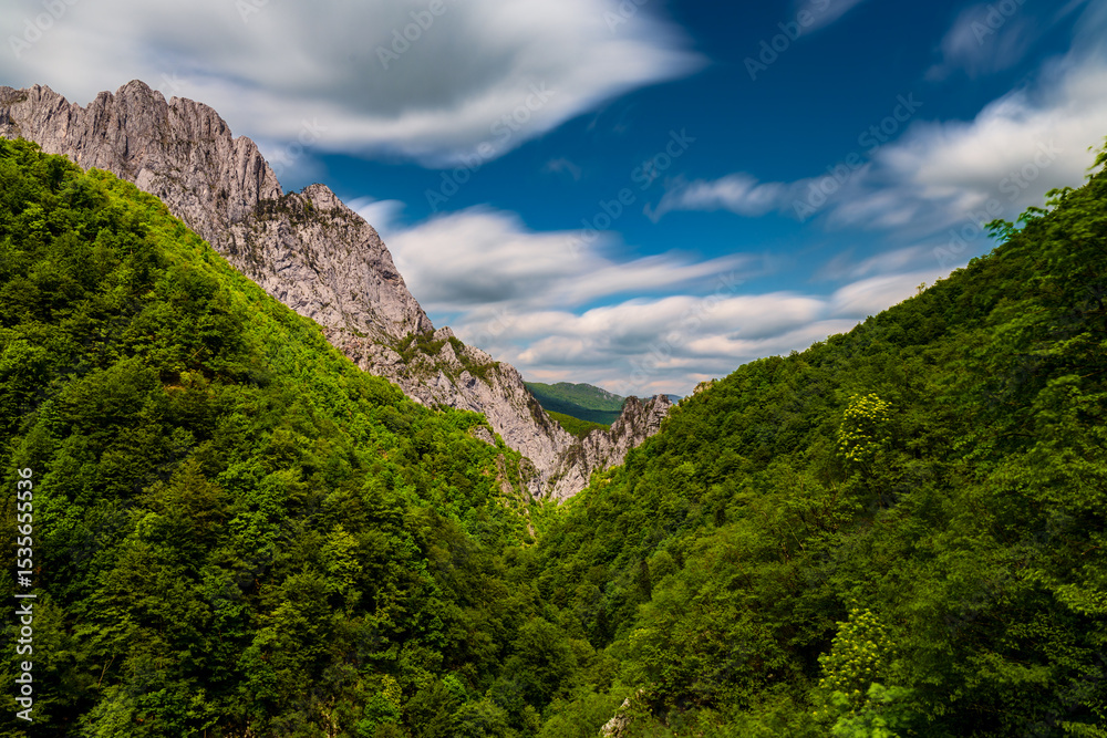 Fototapeta premium Sutjeska National Park in Bosnia and Herzegovina. Mountains and forest in summer. A valley in the mountains near the villages of Tjentište and Kruševo.