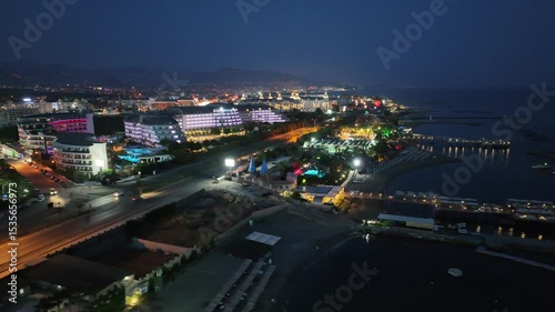 Wallpaper Mural Stunning aerial sunset to night transition over Turkler in Alanya, Turkey. Alanya coastline,resorts,marina,hotels and city lights along the Mediterranean Sea drone view. Mediterranean Sea coastline. Torontodigital.ca
