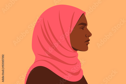 Profile portrait of a strong Black Muslim woman wearing a pink hijab. Concept for Islamic feminism, female empowerment, women's rights, diversity, faith, and modern culture.