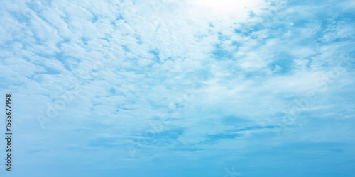 Daylight blue soft clouds, light sunny effect on the blooming white background, sunlight spots on the natural, beautiful spring season clear fresh mind change banner use wallpaper 