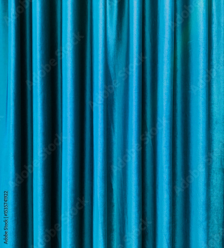 blue satin theater drapes or stage curtains, full frame, evoking elegance, drama, and luxury. Perfect for backgrounds, events, and theatrical themes.