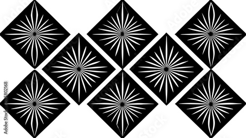 An abstract geometric pattern featuring a repeating array of stylized radiant shapes in a high contrast black and white design.