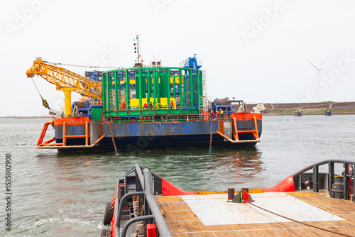 Sea towing of a non-self-propelled barge.