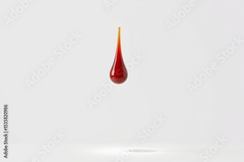 Suspended glossy ketchup drop