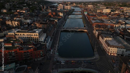 Captivating city view of Cork, Ireland bathed in golden hour light
