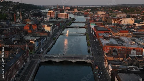 Golden hour over Cork's River Lee illuminates the city's charm and beauty