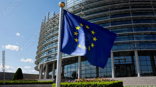 EU Flag Waving Against Clear Blue Sky and Government Architecture