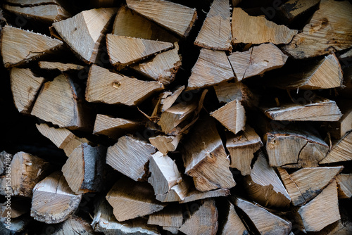 Stacked Firewood Background with Natural Wooden Texture