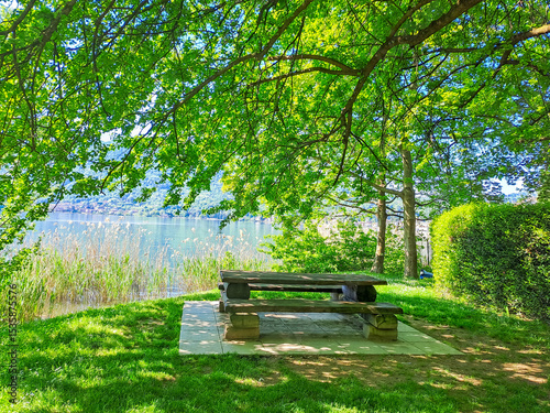Benches with picnic table, Kaslano on the shore of Lake Lugano, Switzerland