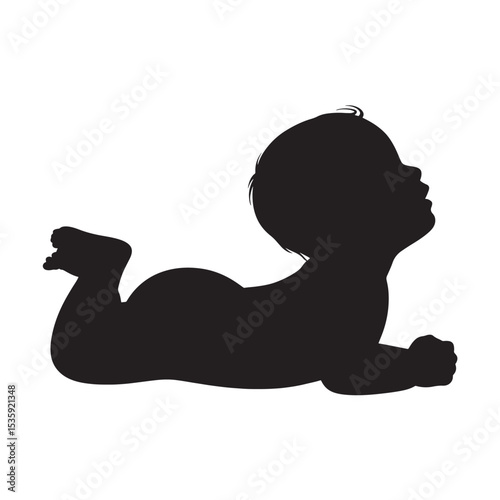 Silhouette of a baby boy lying on his tummy looking upwards in a simple pose