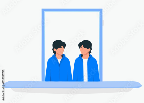 Two young men in blue hoodies, looking through a window, with copy space