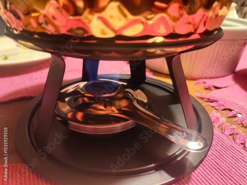 Fototapeta Naklejka Na Ścianę i Meble -  Flame Fondue Pot