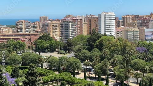 Malaga, Spain - aerial view of Malaga city and beach from Alcazaba, tall office buildings and hotels