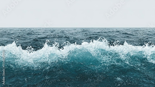 Ocean waves crashing on the shoreline.