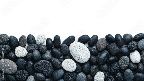 A collection of various stones in shades of gray and black.