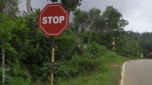 Close-up of red and white stop sign with octagon shape
