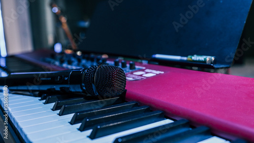 Canvas Print Microphone on midi piano keyboard keys. Recording studio concept